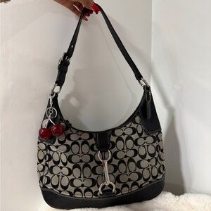 Coach y2k Hobo Black/ Grey Signature
Cavas Shoulder Bag
